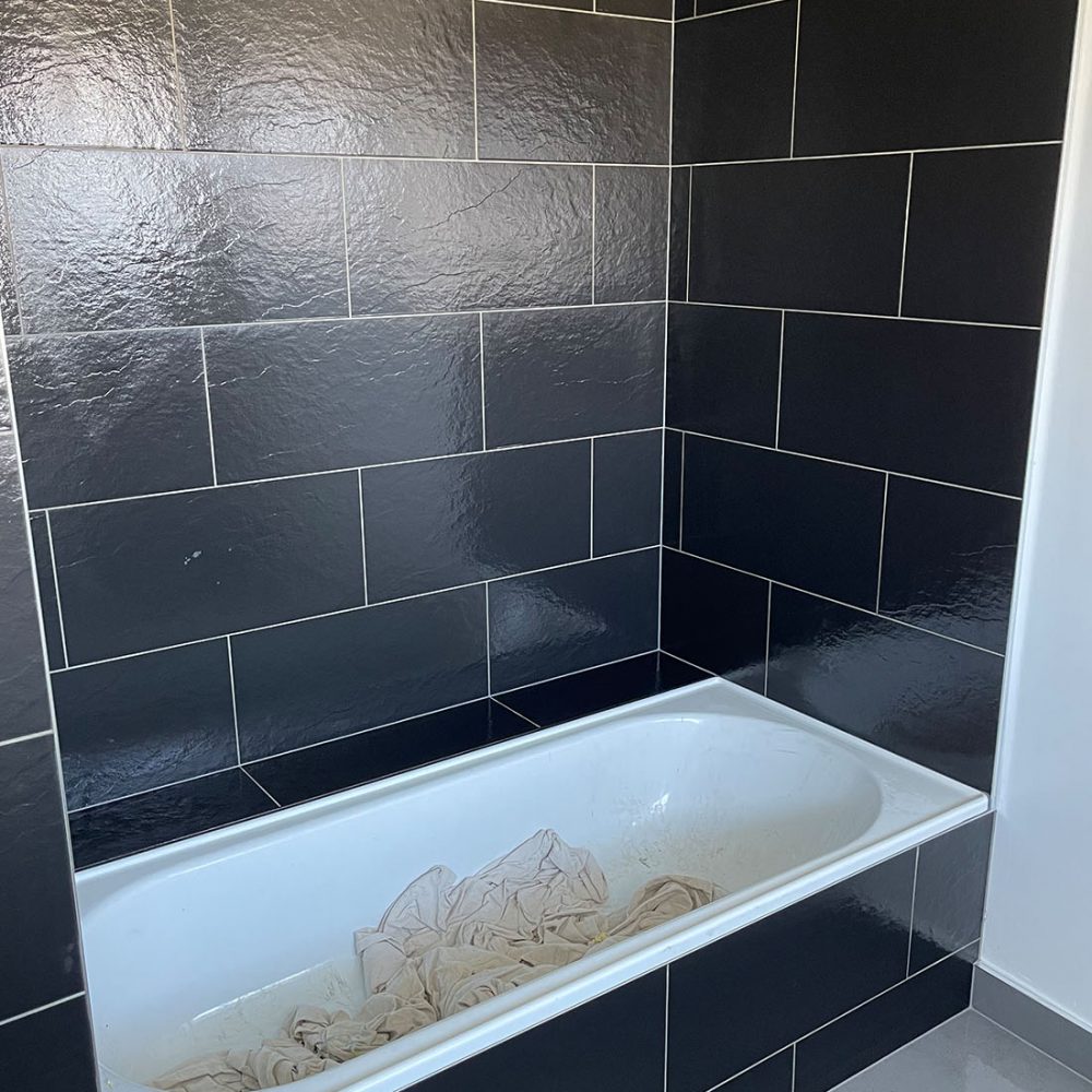 Black shower tile